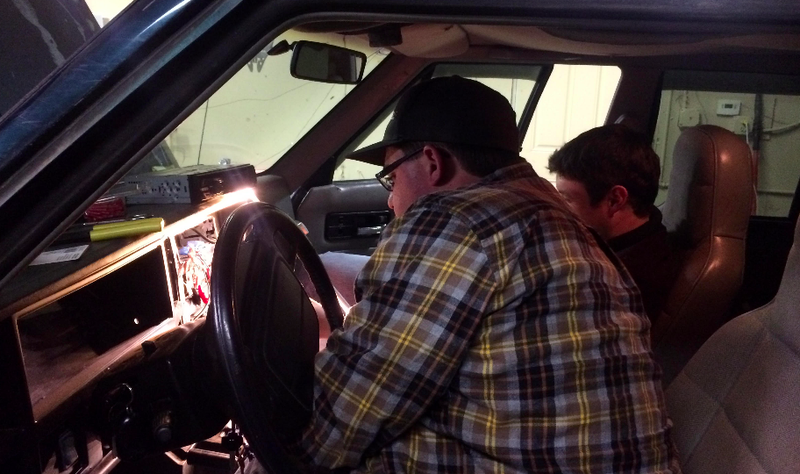 Stephen works his magic on the electrical system.